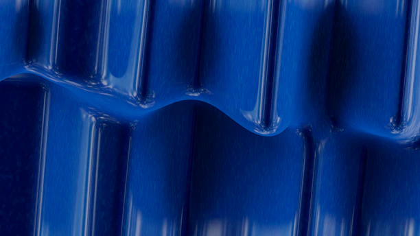 Close-up of a smooth, glossy epoxy floor with subtle metallic blue accents.