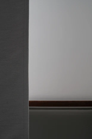 Close-up of a thin vertical line dividing a clean, spacious webpage background.