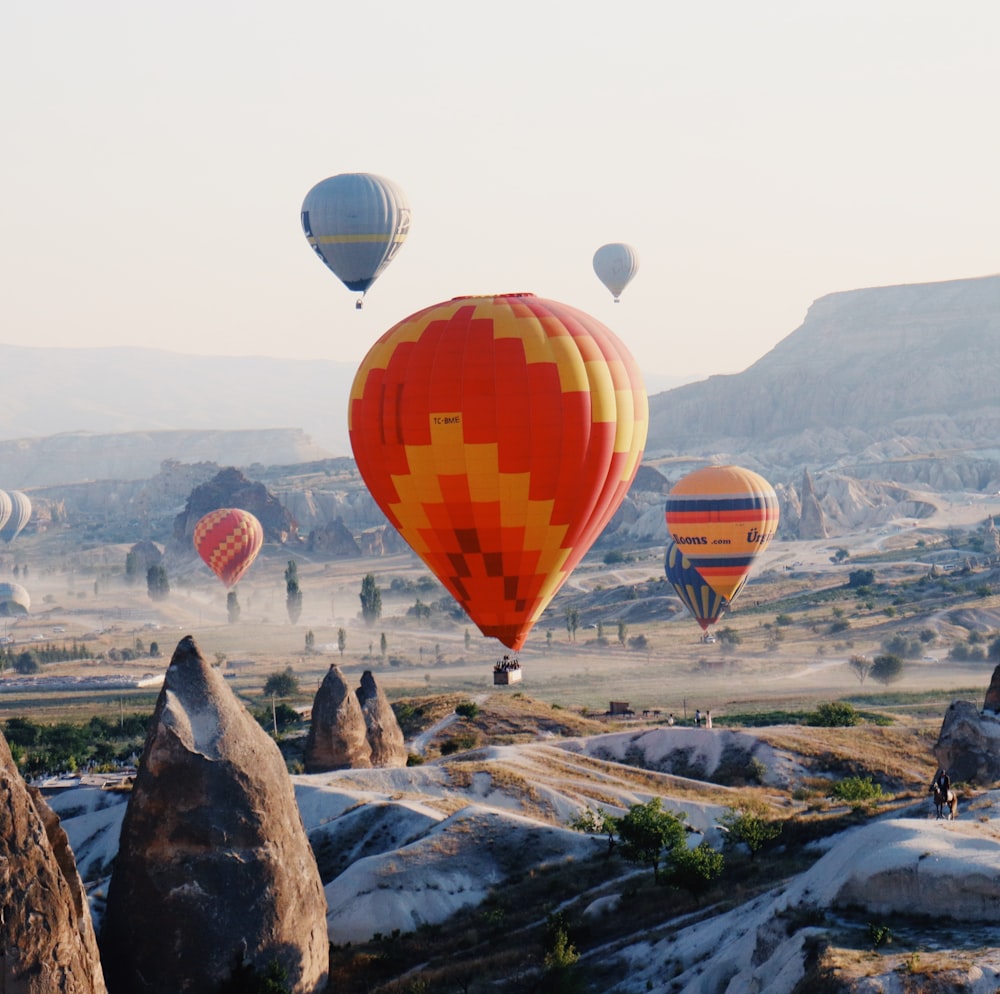 a group of hot air balloons in the sky