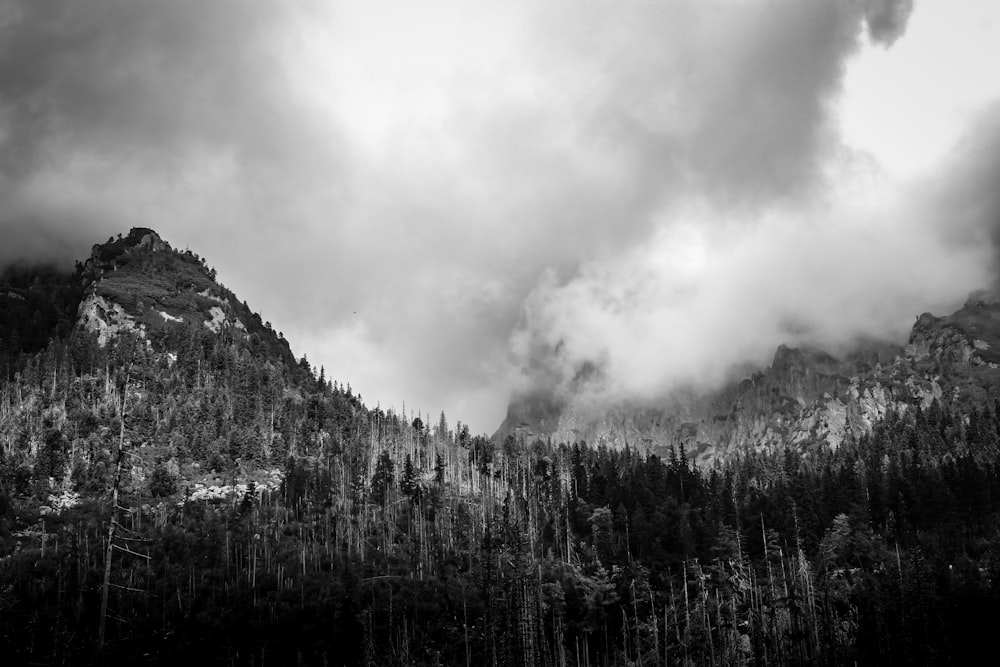 a mountain with clouds above it