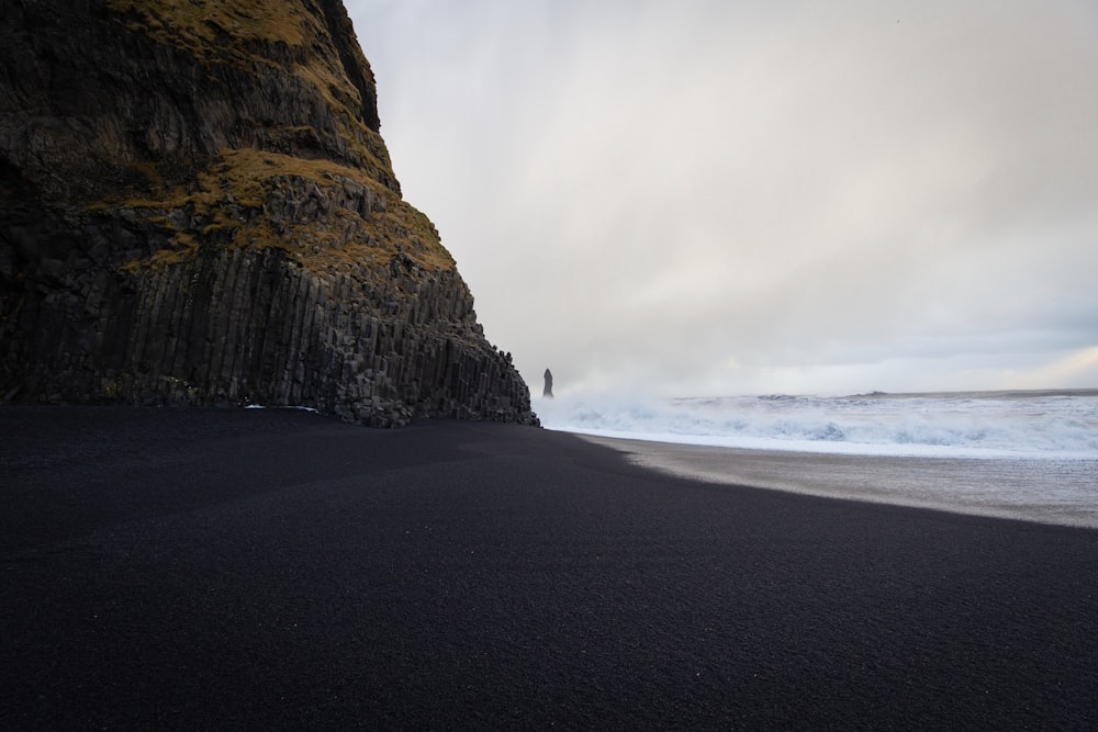 a person standing on a beach