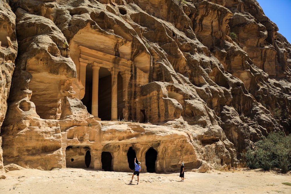 people walking in a desert