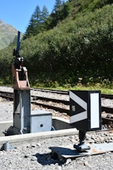 a train track with a sign on it