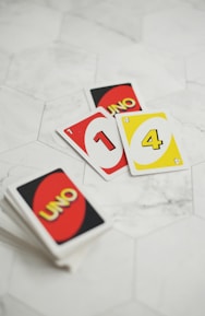 a group of cards on a white surface