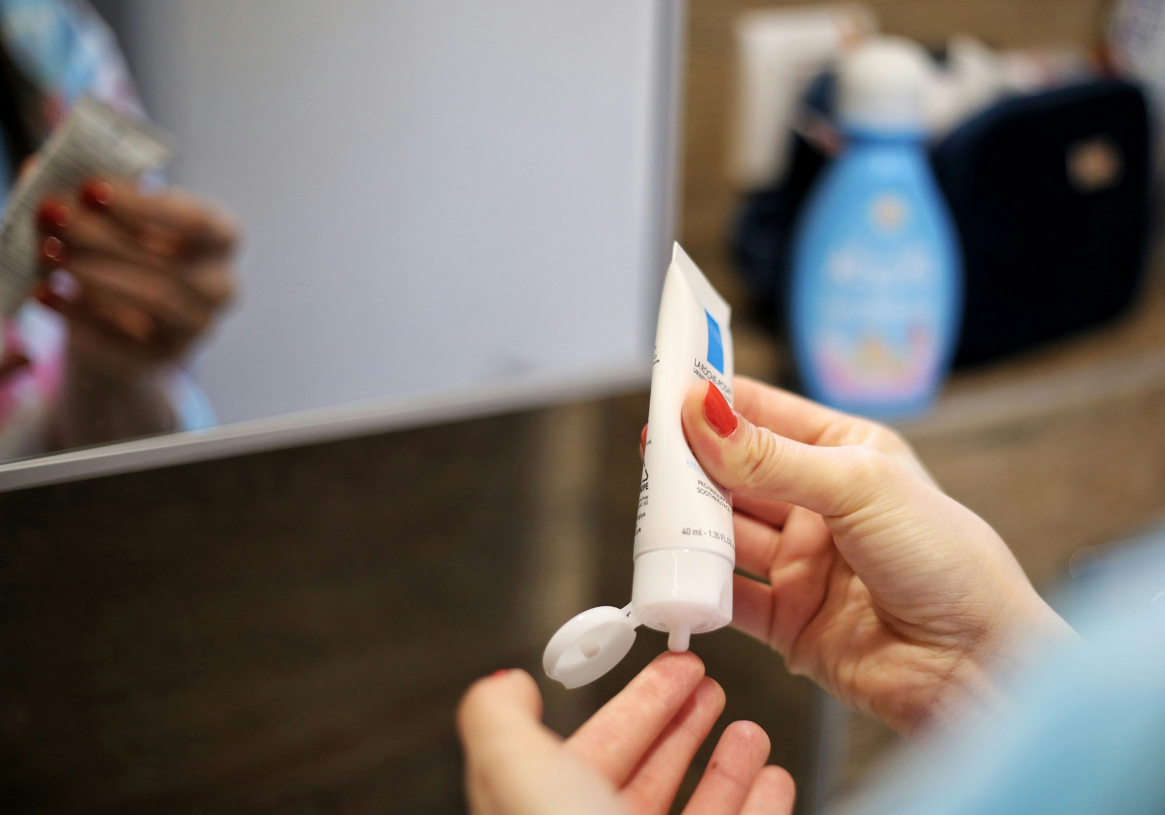 a person holding a white object