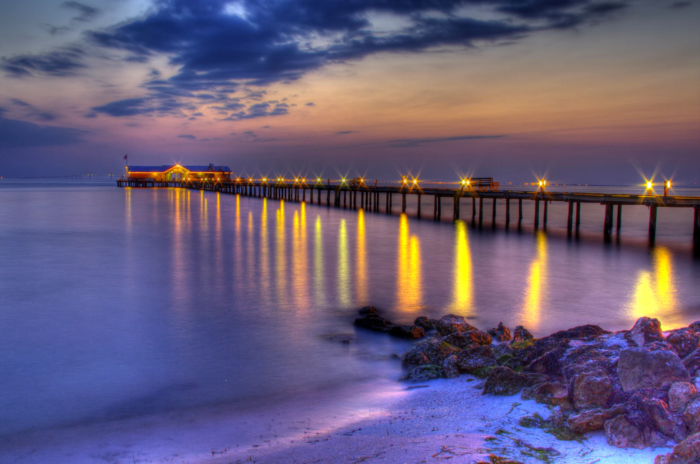 Boat dock with lights at dawn