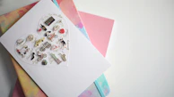 A card decorated with colorful handprints and a warm 'Get Well Soon' note.