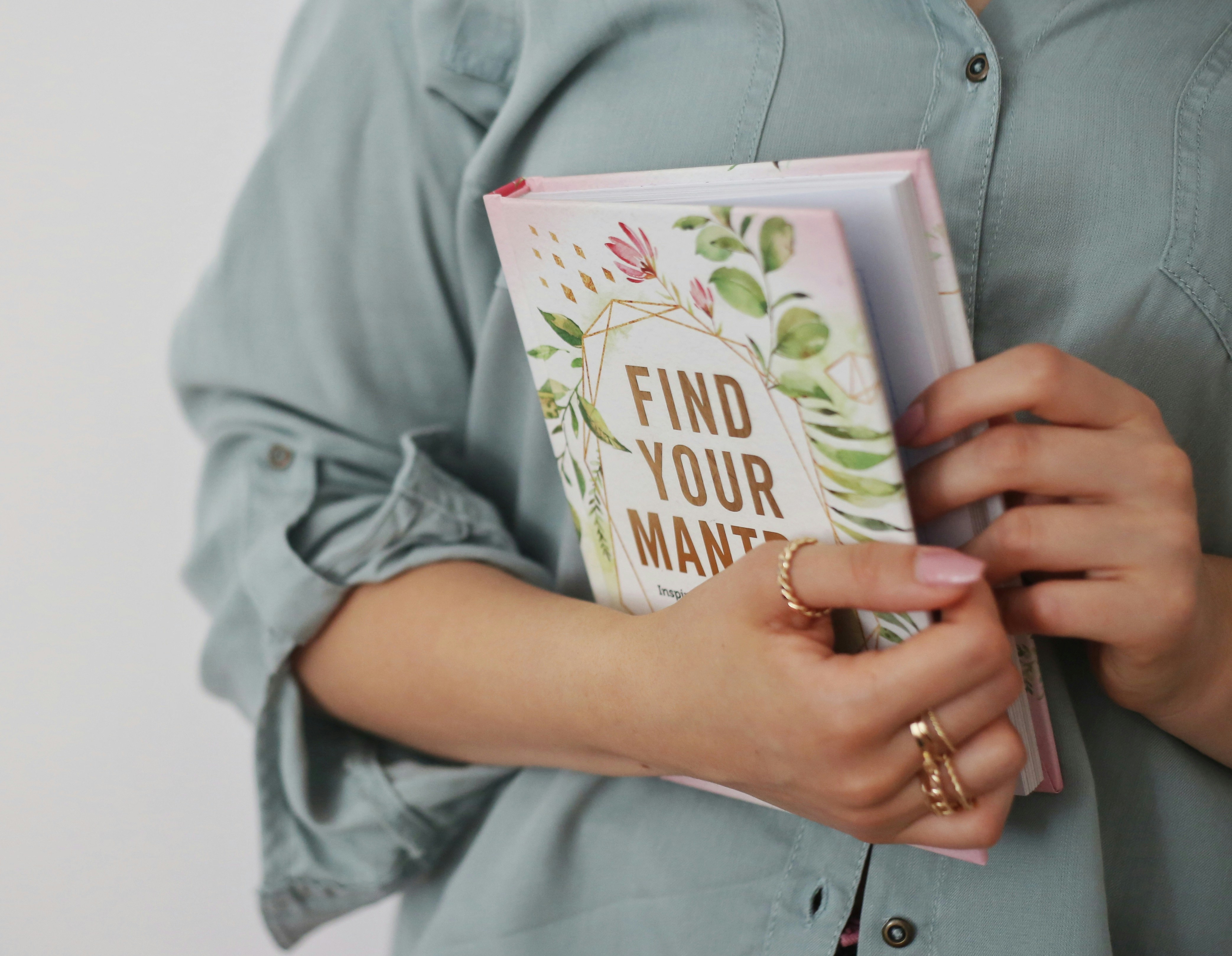 A collection of self-care journals laid out on a table