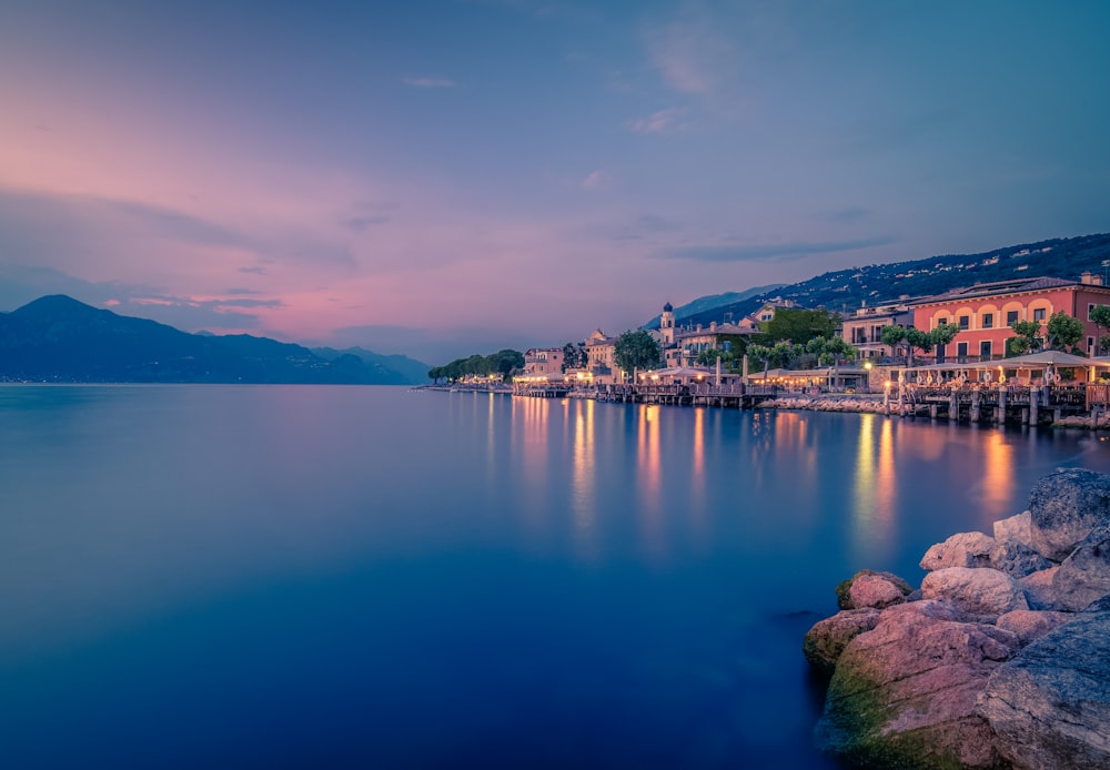 a body of water with buildings along it