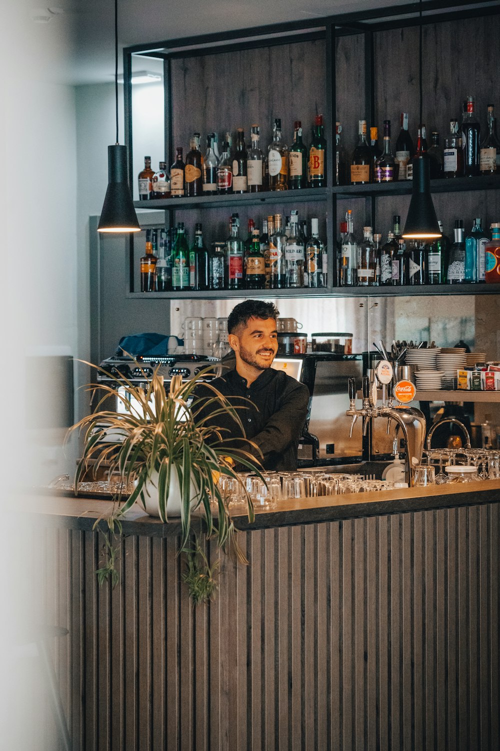 a person sitting at a bar