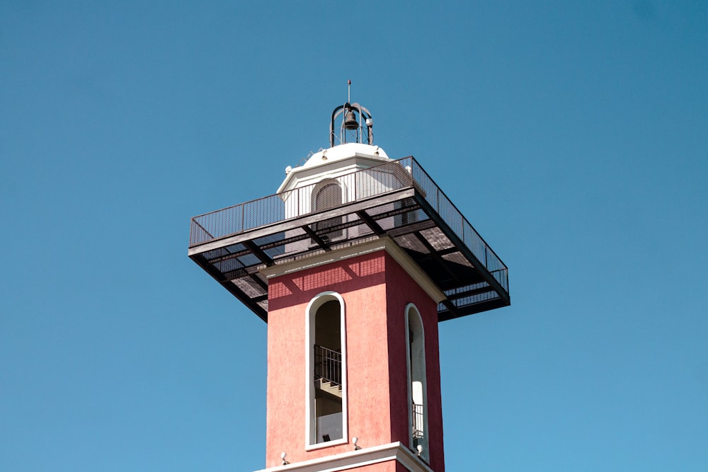 a lighthouse with a blue sky