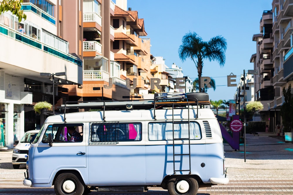 a white van parked on the side of a street