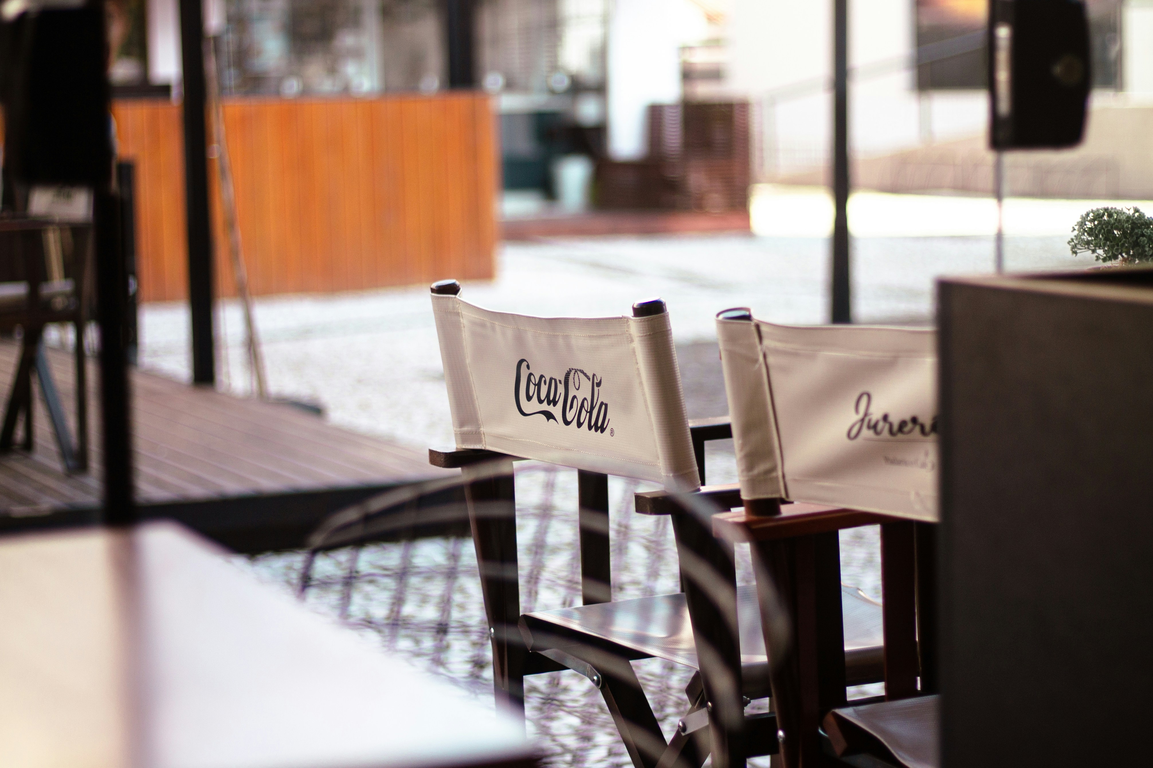a couple of chairs with a sign on them