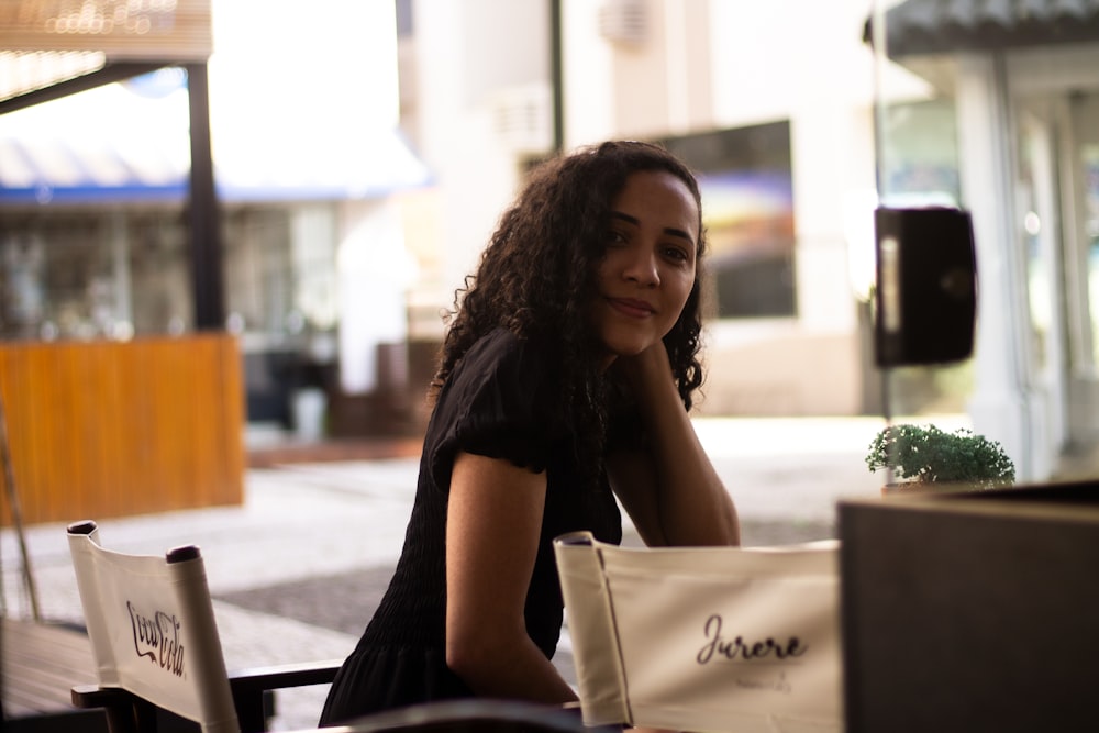 a woman sitting at a table