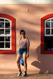 a person standing in front of a wall