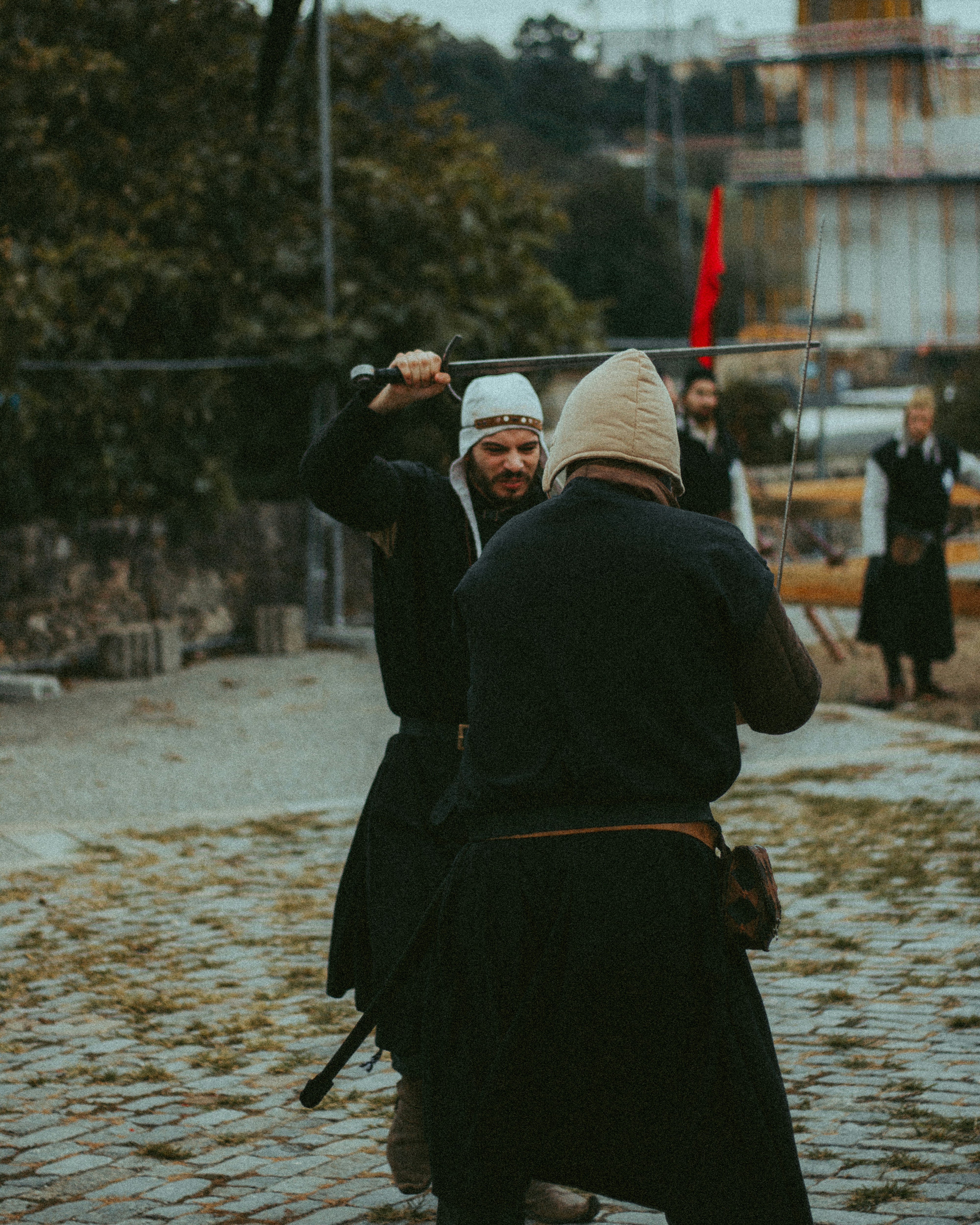 a couple of people holding guns