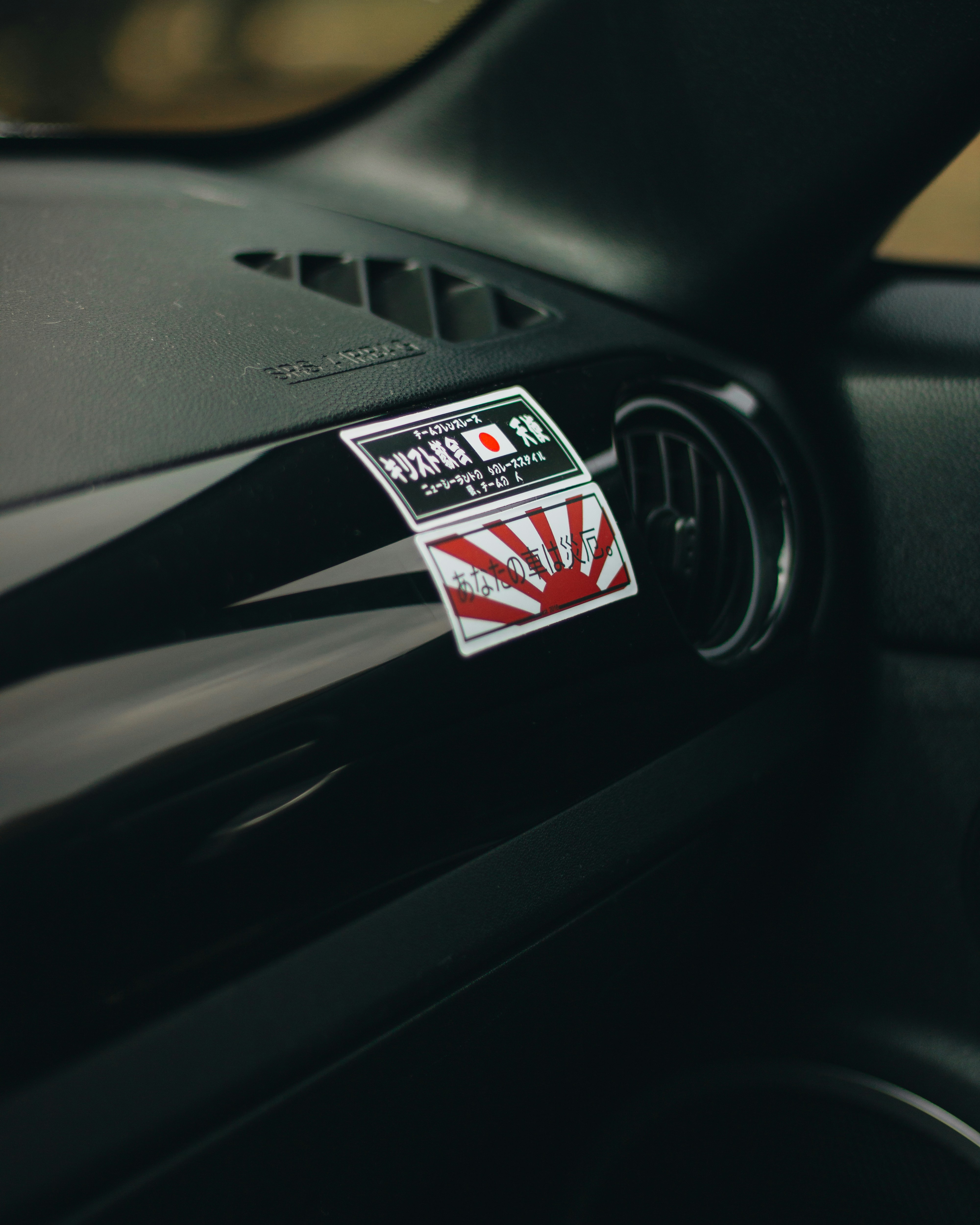 a sticker on a car dashboard