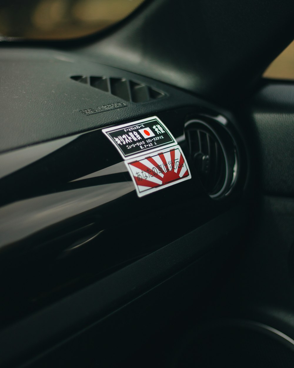 a sticker on a car dashboard