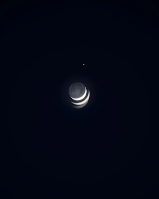 A layered collage blending moonlit skies with vintage floral patterns.