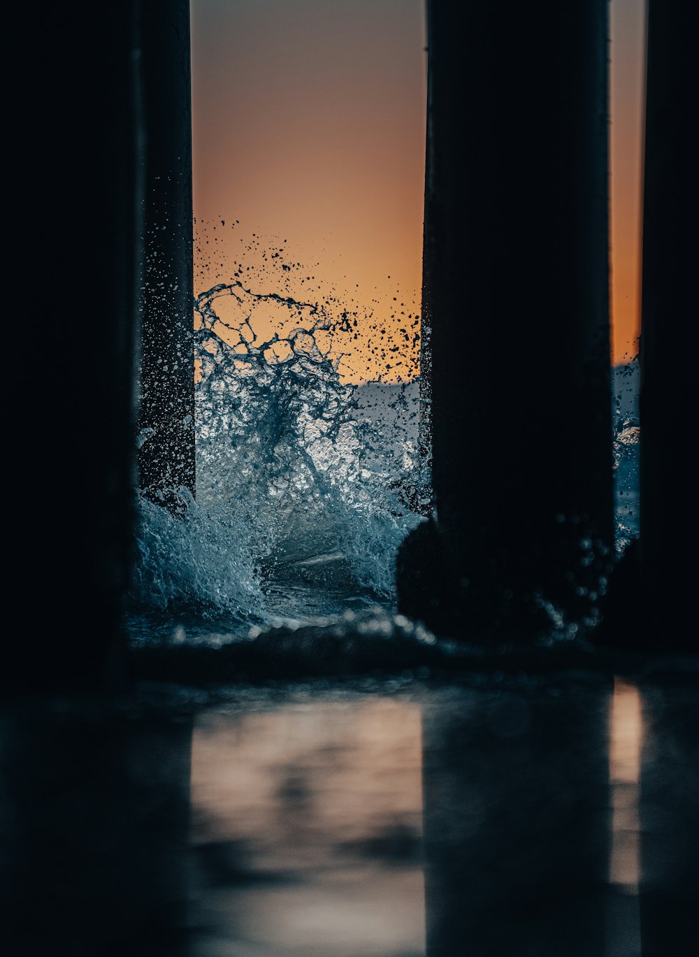 a window with a tree and water