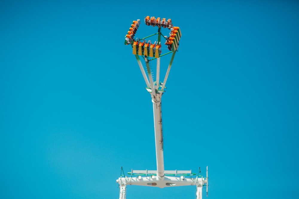 a large tower with a group of people on it