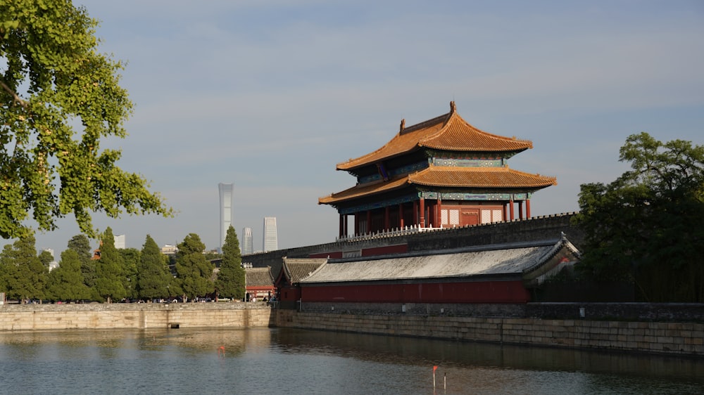 a building next to a body of water