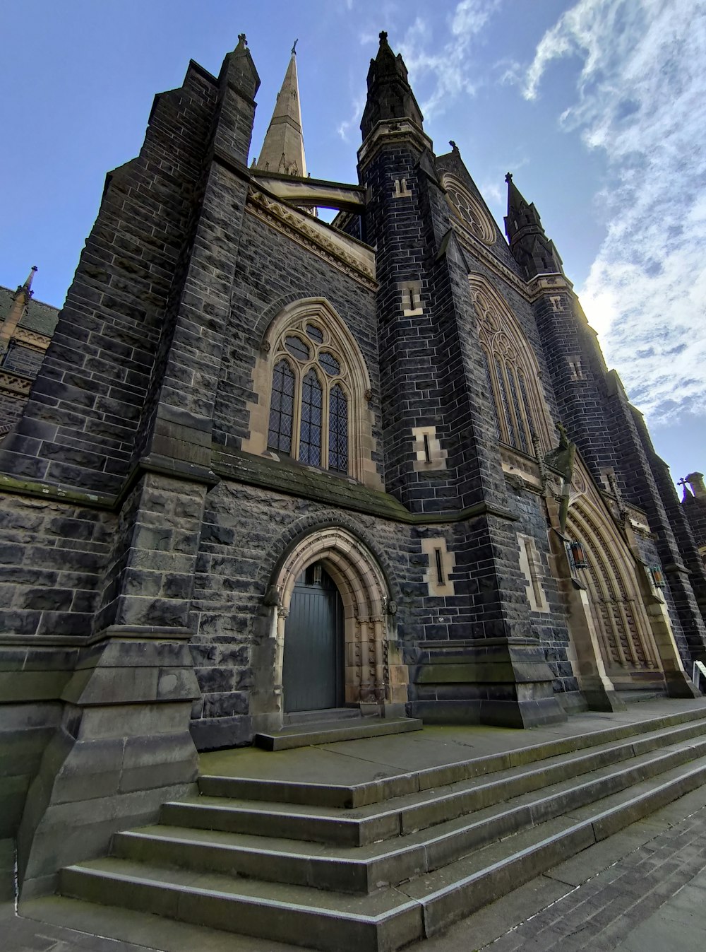 a stone building with a staircase