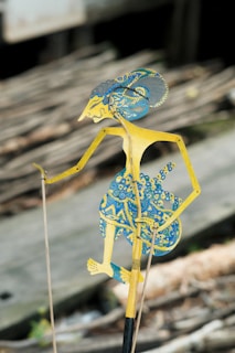 a yellow and blue insect