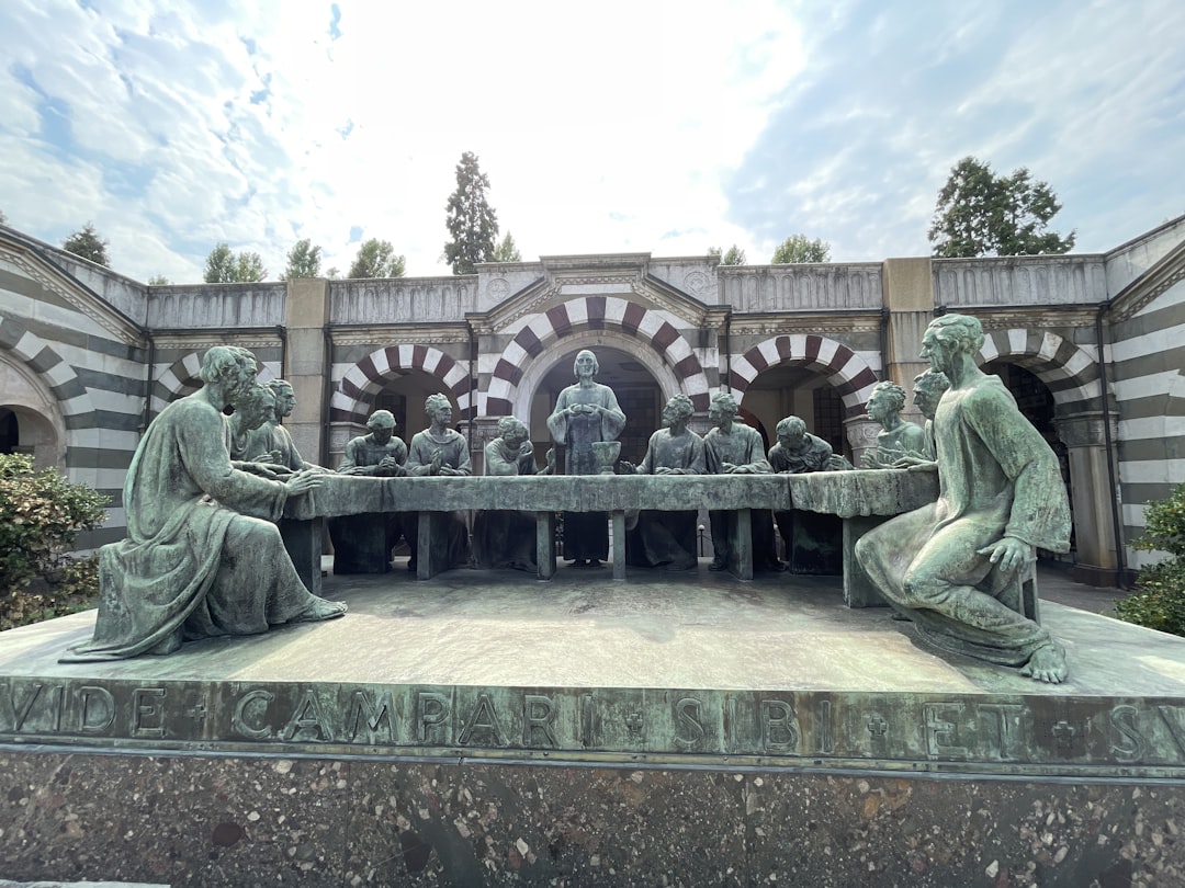 a group of statues in front of a building, Sculpture of the Last Supper in the Monumental Cemetery in Milan.<p></figure>Campari Tomb</p><p>Sculptor: Giannino Castiglioni</p><p>1935