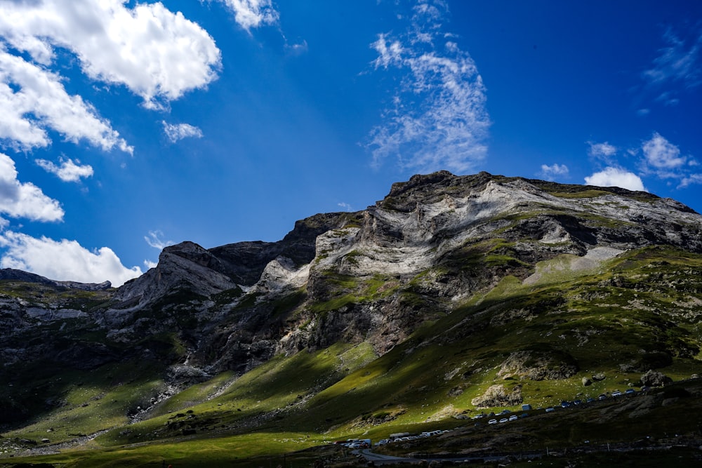 a mountain with a valley below