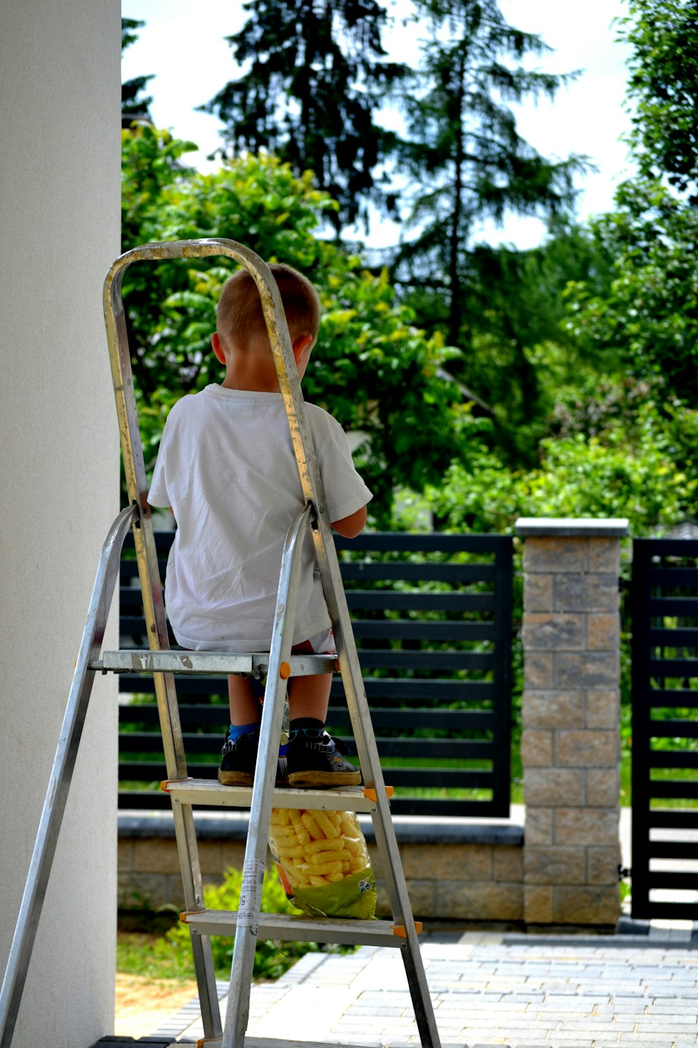 a boy sitting on a chair