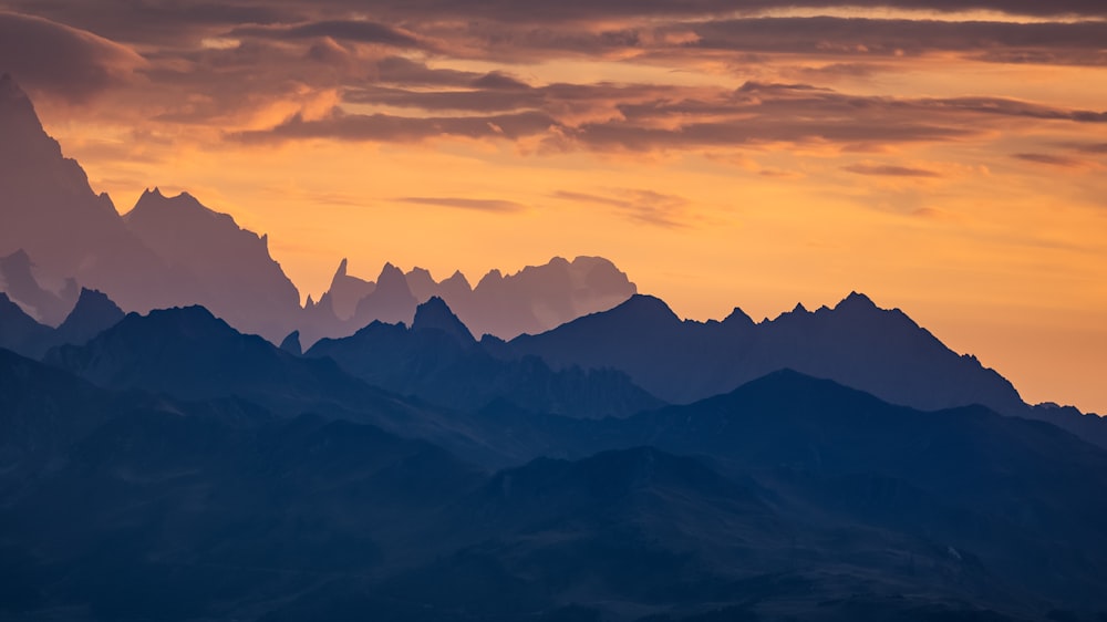 a mountain range with a sunset