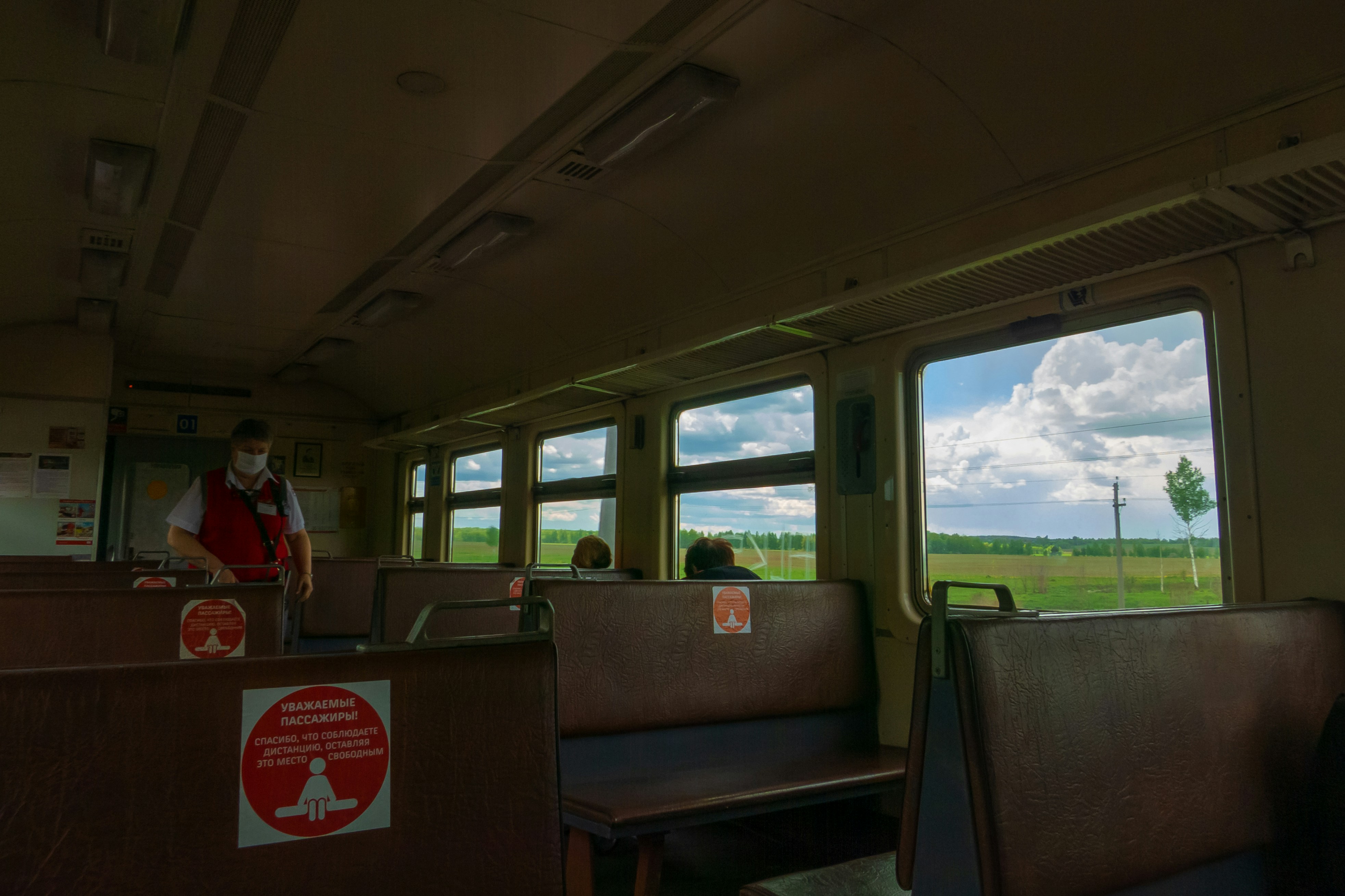 a person stands in a train, 