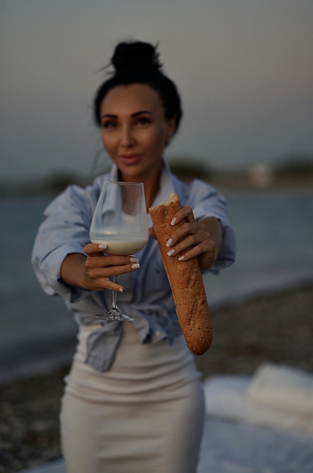 a person holding a glass of wine