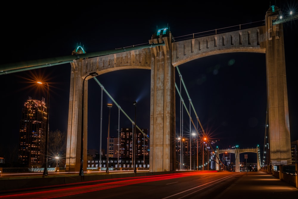 a bridge with lights at night