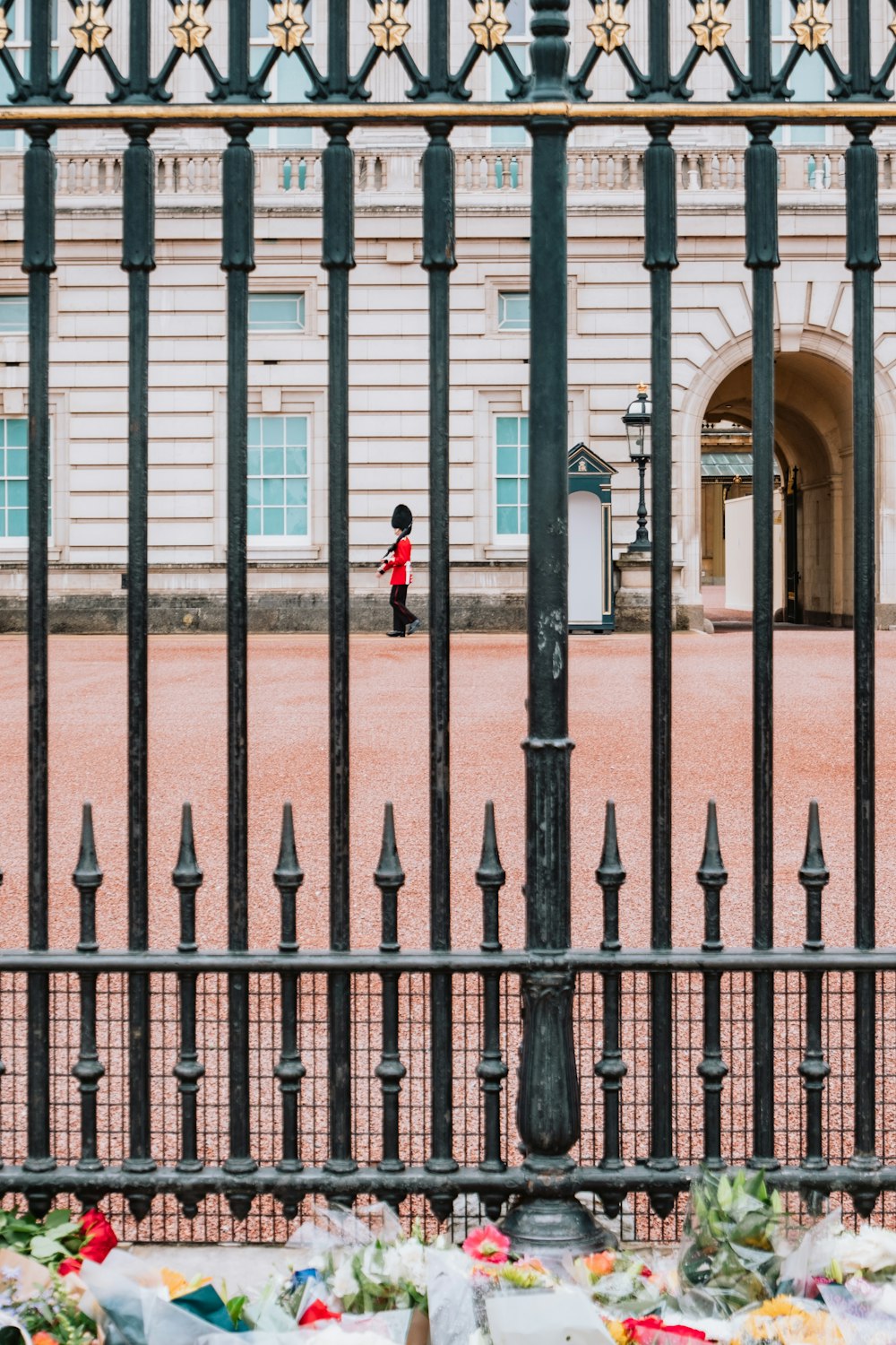 a person standing in front of a gate