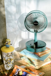 a sculpture of a globe and a toy figurine
