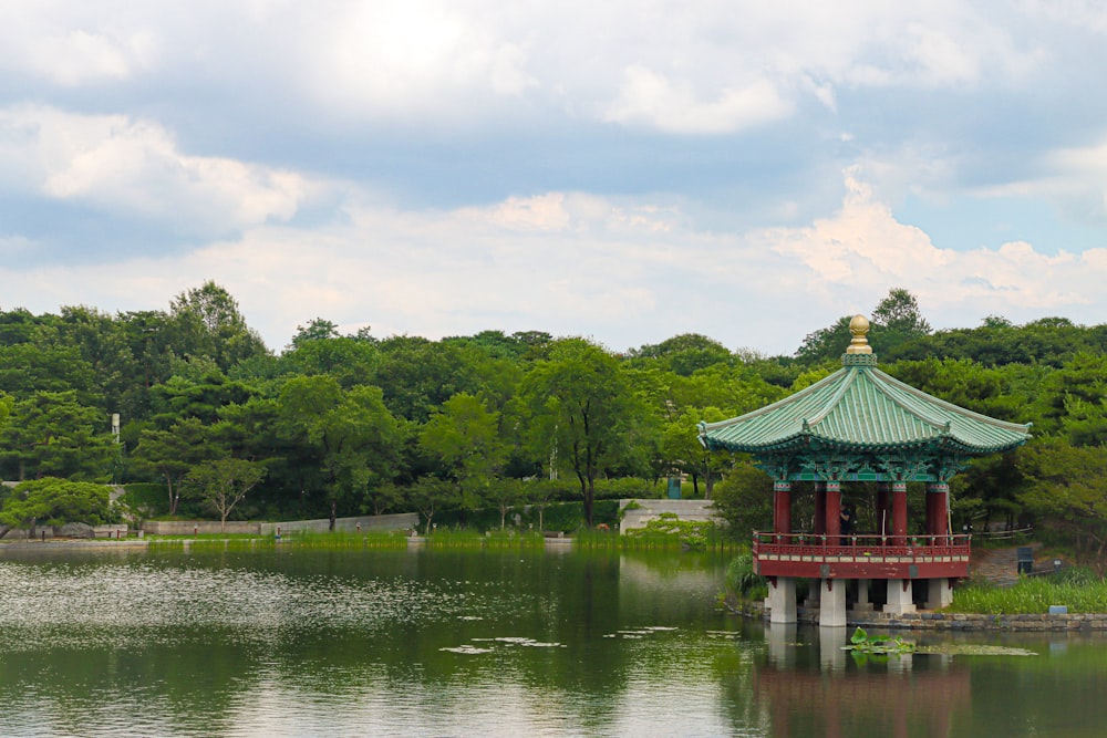 a pagoda by a lake