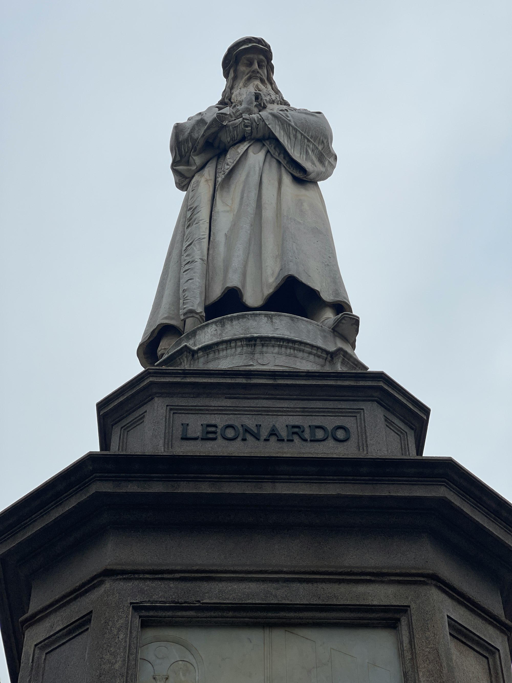 Statue of Leonardo da Vinci in Milan sculpted in 1872 by  Pietro Magni. It is outside the Galleria Vittorio Emanuele II, the famous shopping centre.

