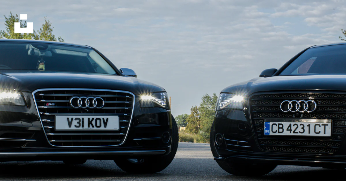 Two cars parked next to each other photo – Free Automobile Image on ...