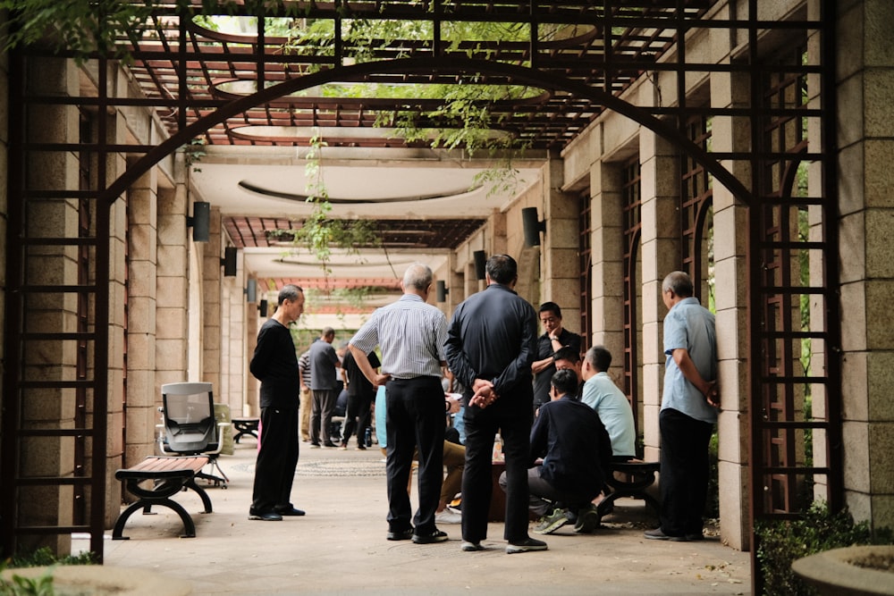 a group of people standing outside a building