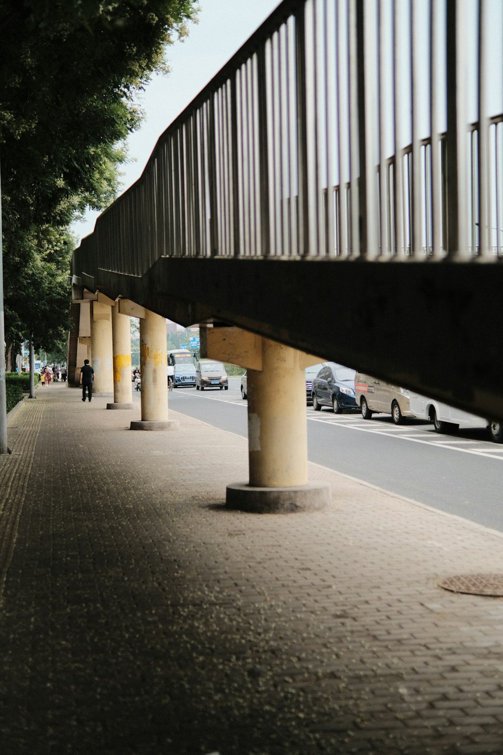 a road with cars and a building