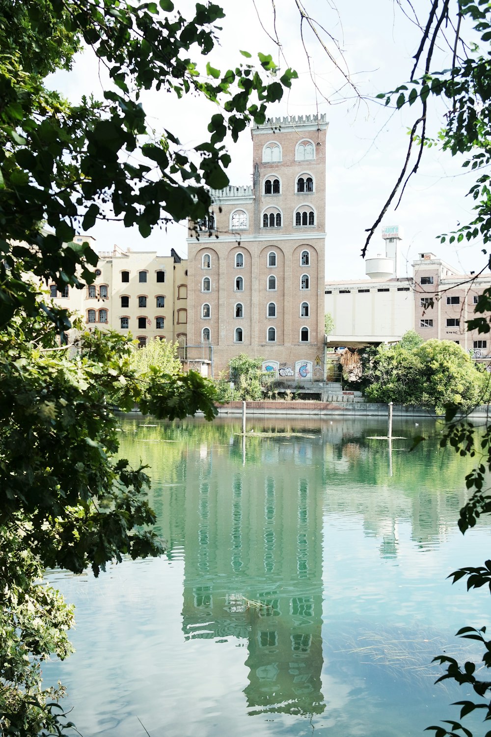 a body of water with buildings around it