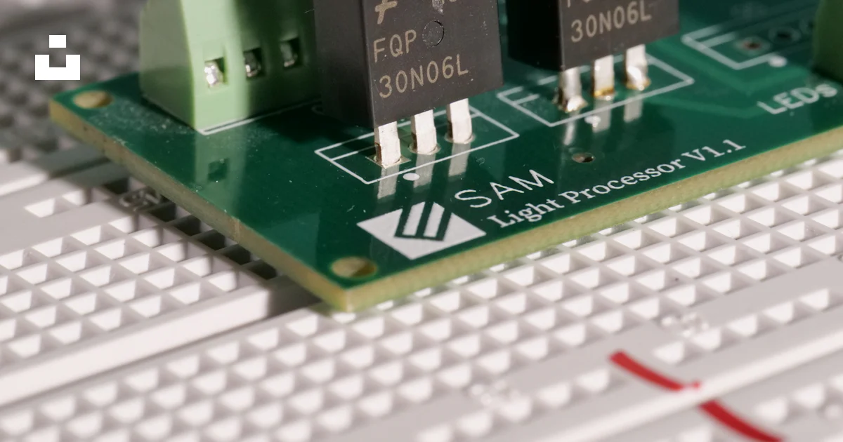A circuit board with many small chips photo – Free Transistor Image on ...