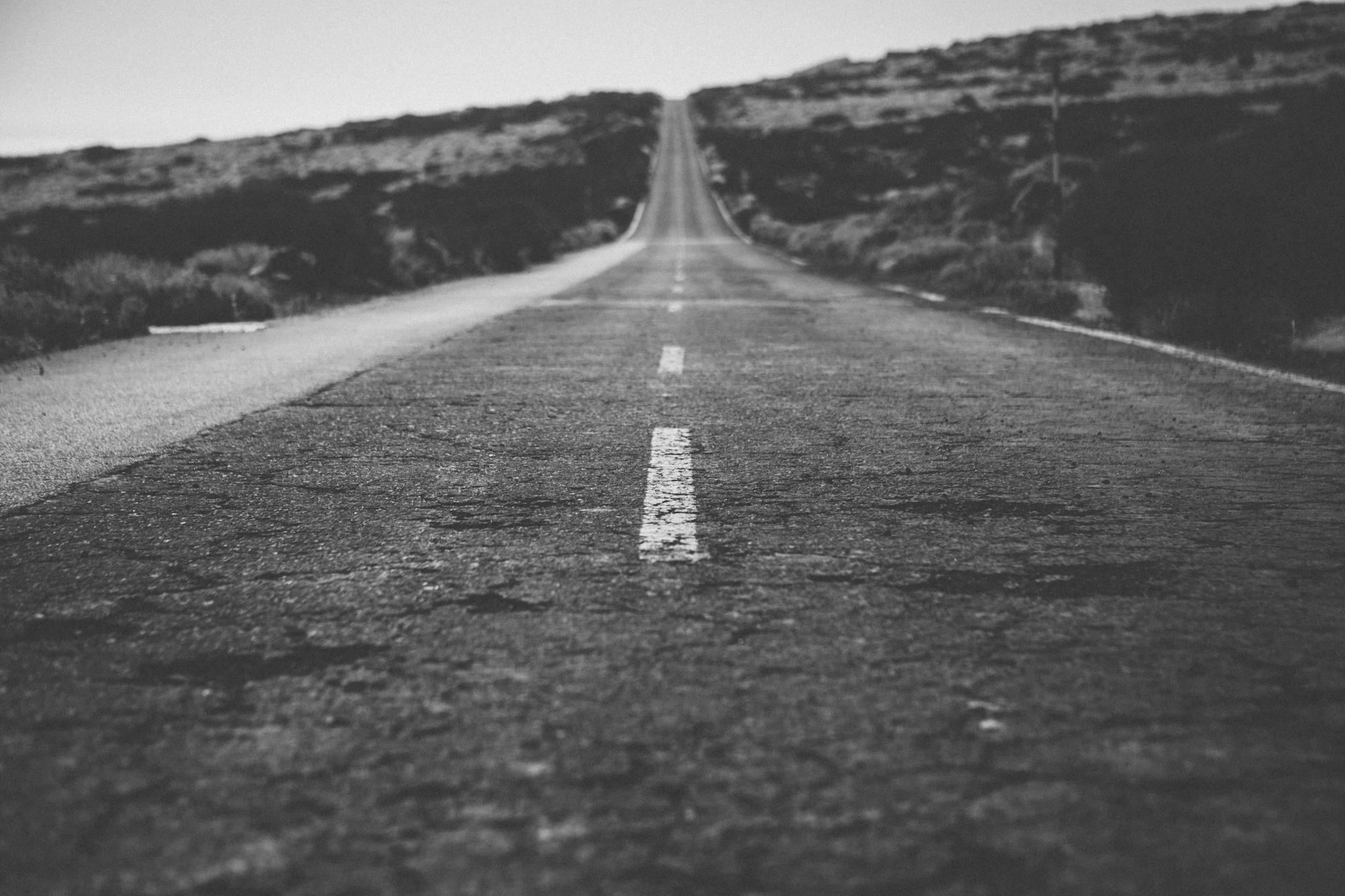 a road with a line of white lines on it