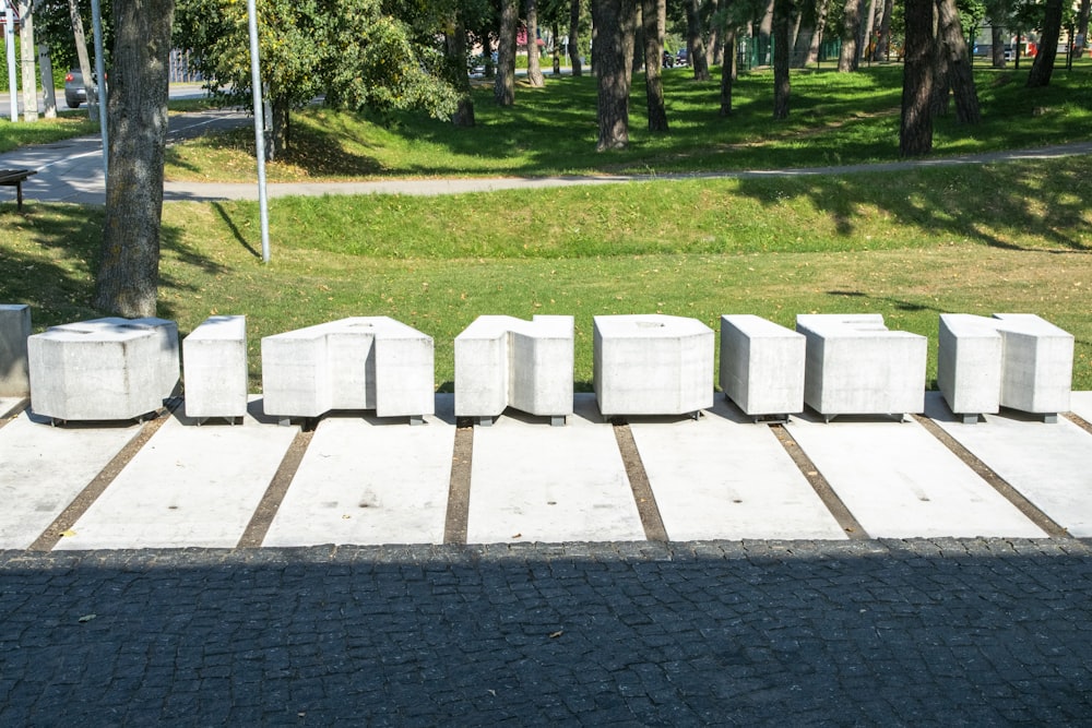 a group of white headstones