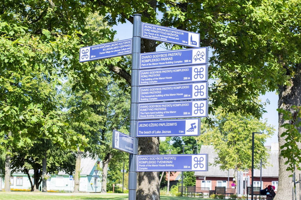 a street sign with many street signs