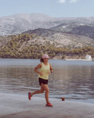 a person running on a beach