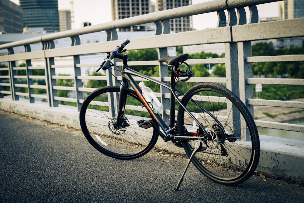 a bicycle parked on a sidewalk