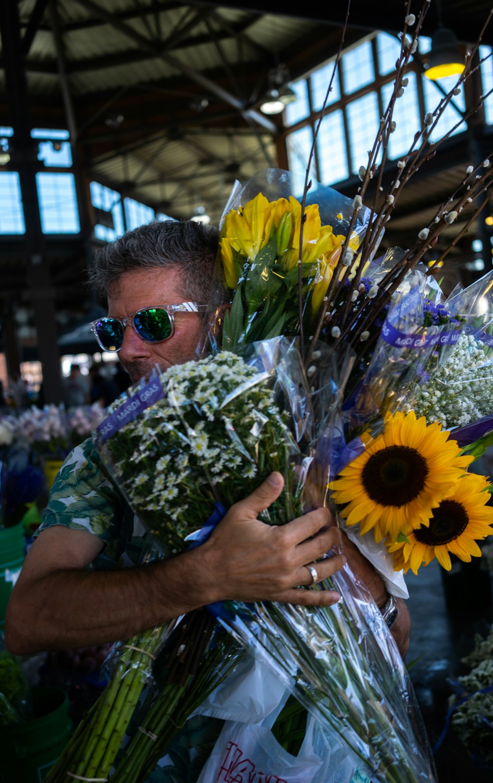 a man holding flowers